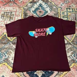 Maroon “skate more” T-Shirt.